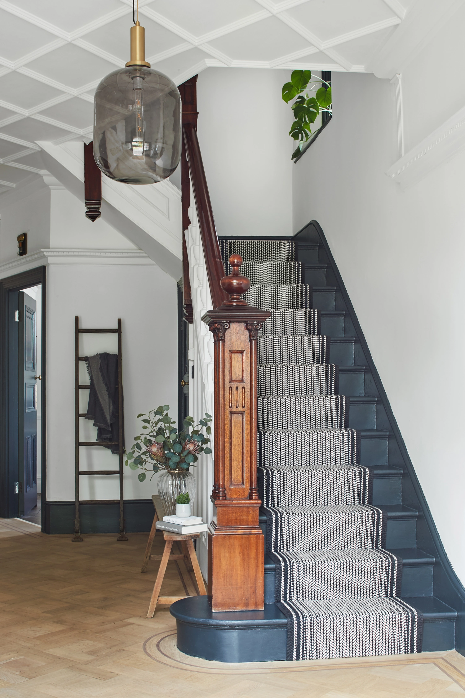 A Roger Oates white and blue knit pattern runway carpet
