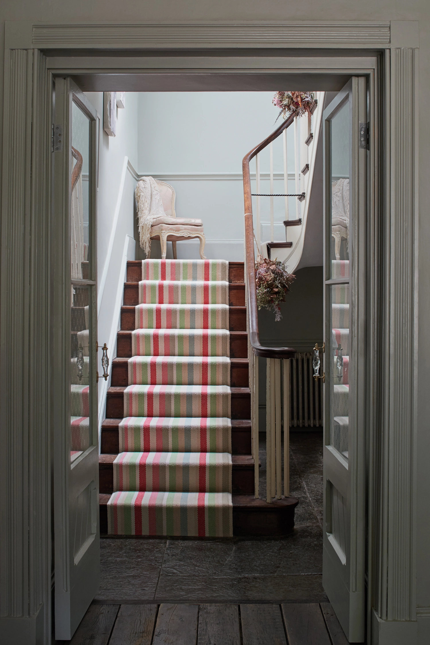 A pastel coloured striped Roger Oates runway carpet