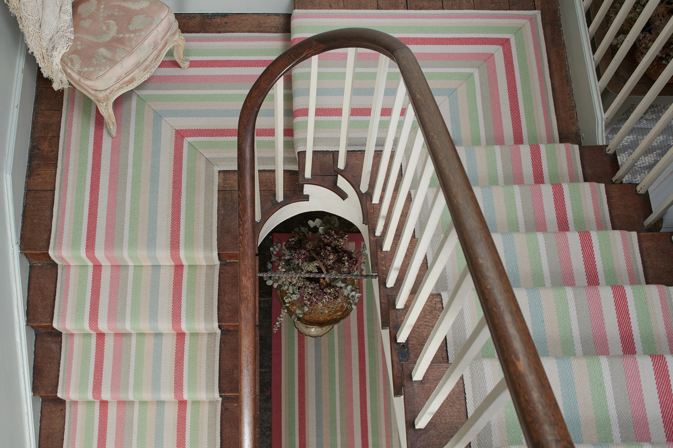 A pastel coloured striped Roger Oates runway carpet