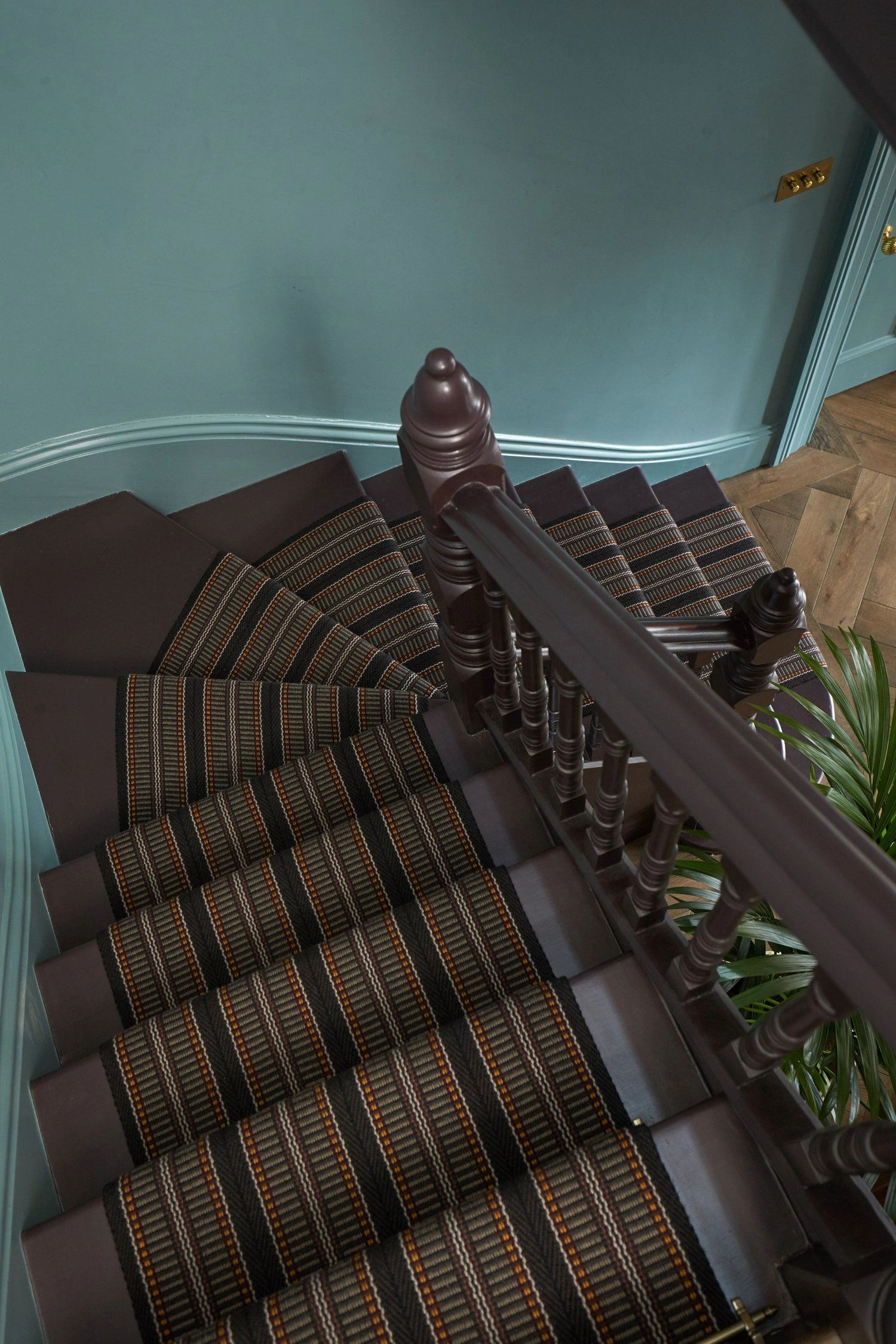 A brown striped Roger Oates runway carpet